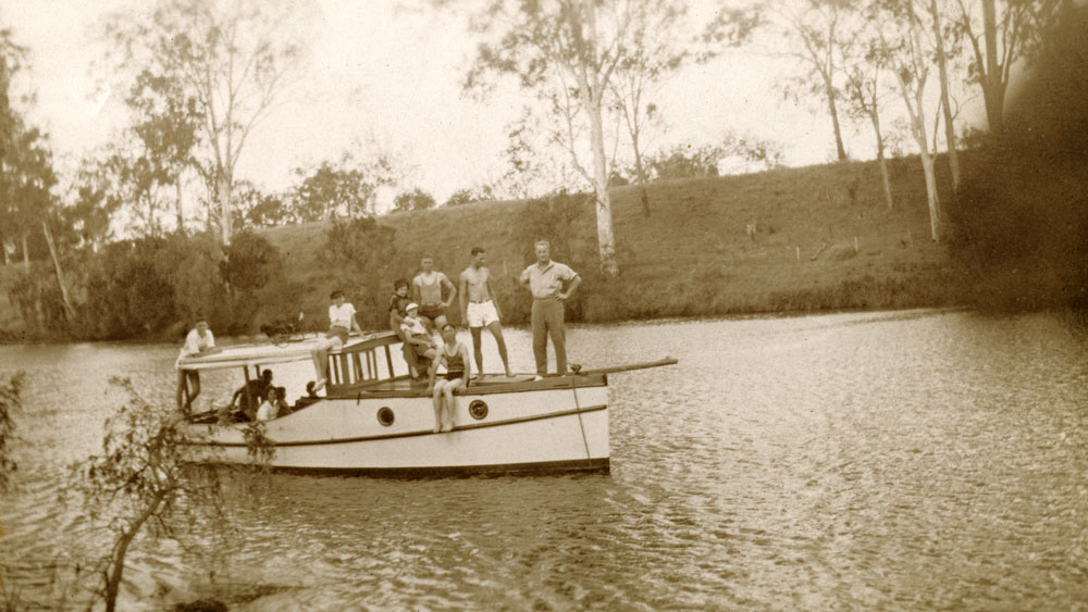 People on Bill Booth's boat 'The Islander' on the Bremer River, Ipswich, 1930s