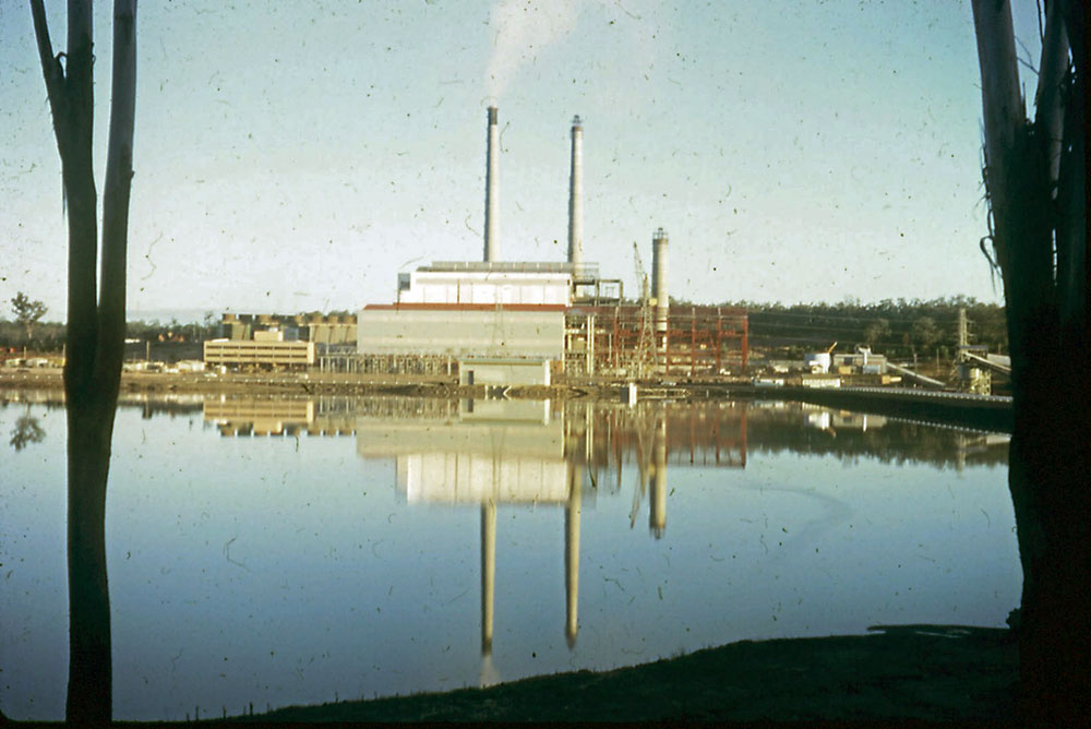 Swanbank Power Station, showing reflection in water, Swanbank, Ipswich, 1966