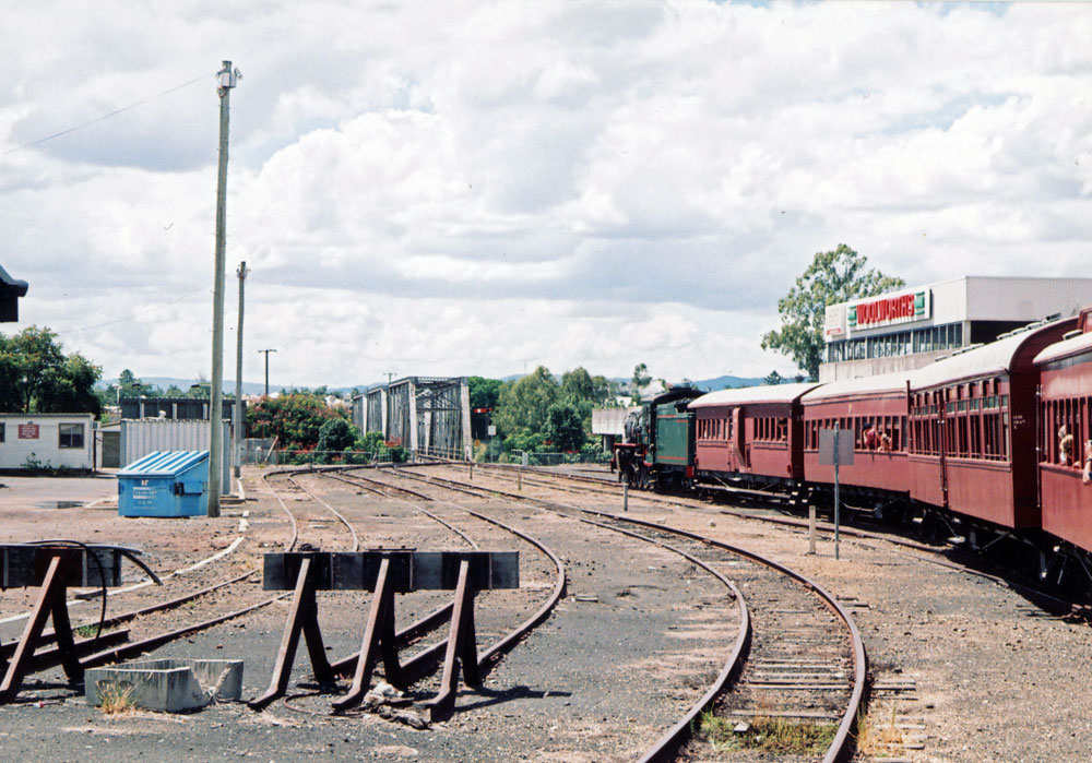 Steam train beside Woolworths Supermarket, Ipswich, 2000-2005