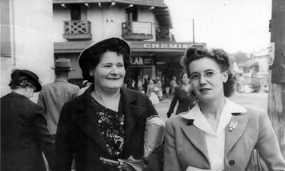 Women in front of Nolan's Pharmacy, corner Nicholas and Brisbane Streets, Ipswich, 1940s