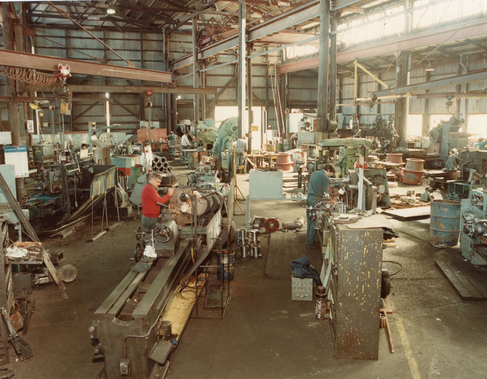 Men working in the Interior of Scotts Foundry, Brisbane Street, West Ipswich, 1985