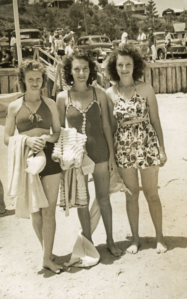 Sisters, Ailsa Duce and Lola Boyle (nee Duce) with a friend at Kirra Beach, on the Gold Coast, Queensland, 1947