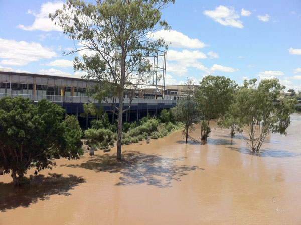 View of Riverlink Shopping Centre from River Heart Parklands, during flooding, Ipswich, 2013