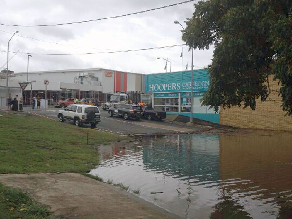 View up Brisbane Street, looking towards Coles and Hoopers Carpets, during flooding, Ipswich, 2013