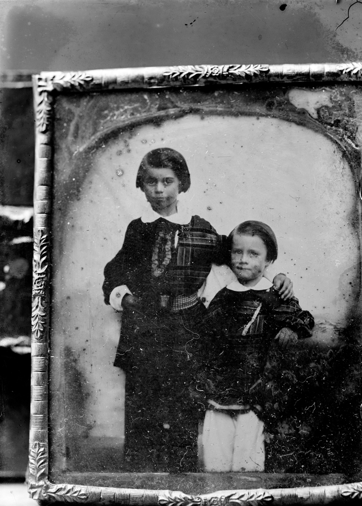 Photographed copy of a Daguerreotype, depicting two young children, original image 1850s, copy, 1900s.