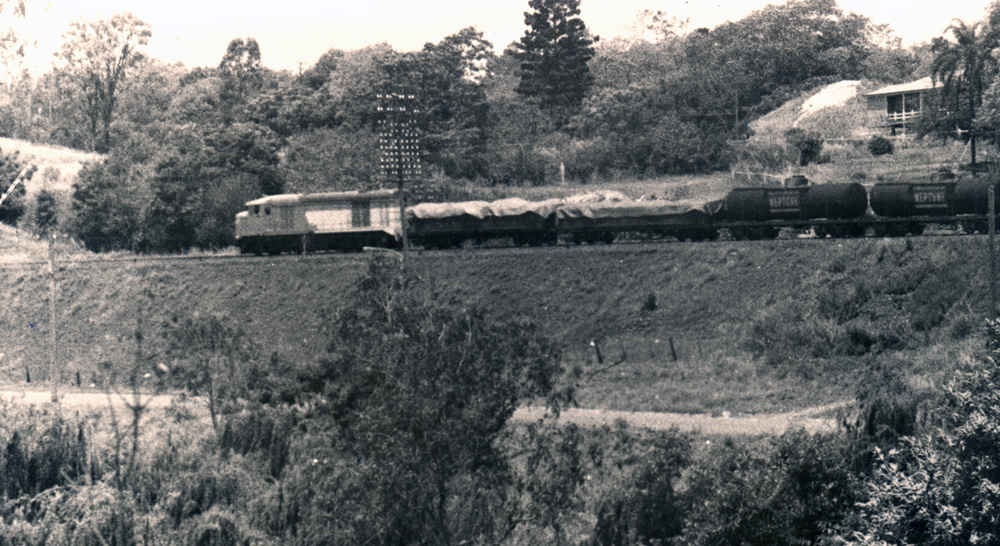 Brisbane bound train on Ipswich railway line along King Edward Parade, in the early 1950s