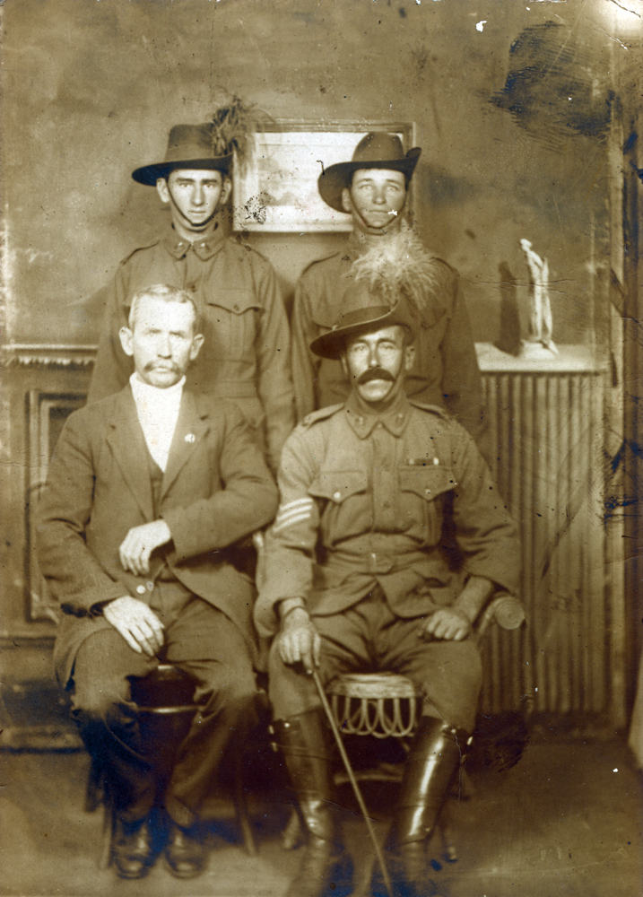 Daniel Scanlon of Ipswich with friends, location unknown, 1915-1917