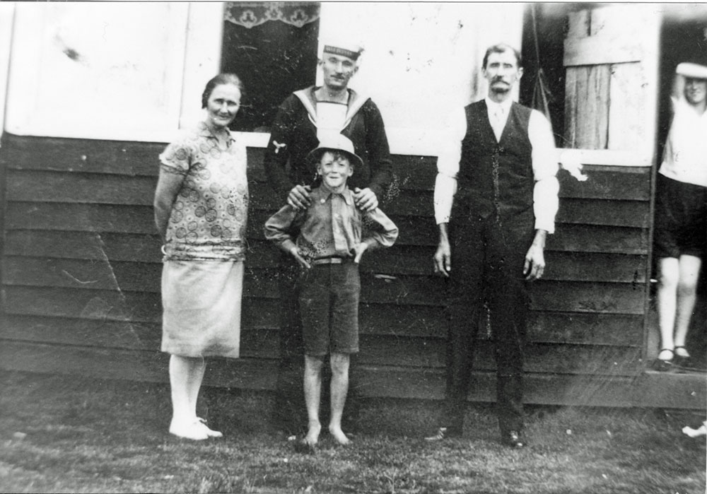 James Rupert Trevis, in uniform, with members of his family, Blackstone, Ipswich, 1927 - 1928