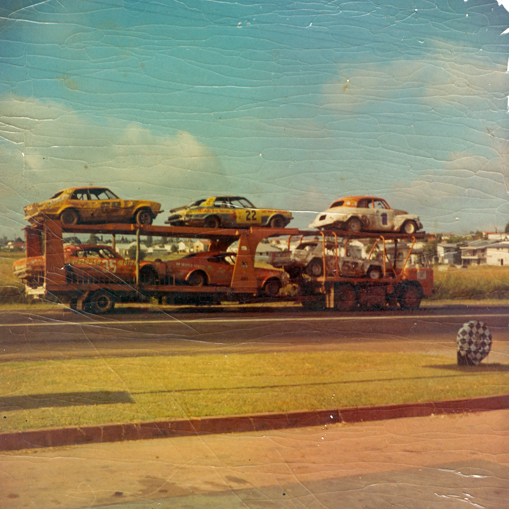 Road transport carrying cars to saloon car titles, Eastern Heights, Ipswich, 1970s