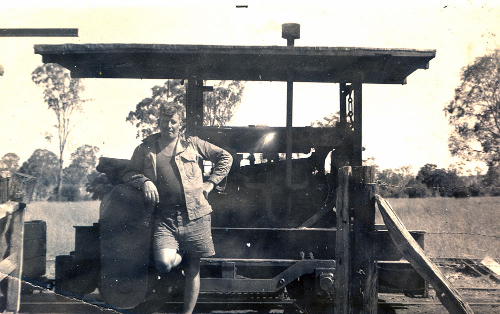 Gordon Yarrow in front of the shuttle train known as "Lizzie", Thagoona, Ipswich, mid 1950s