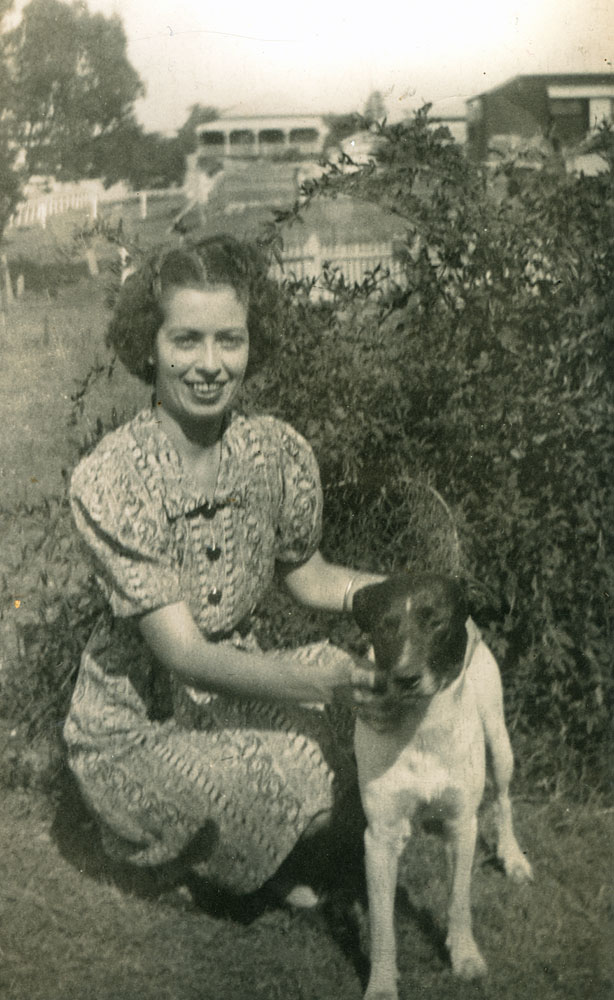 Gladys  Elizabeth Richards with dog in  James  Street, East Ipswich, 1930s