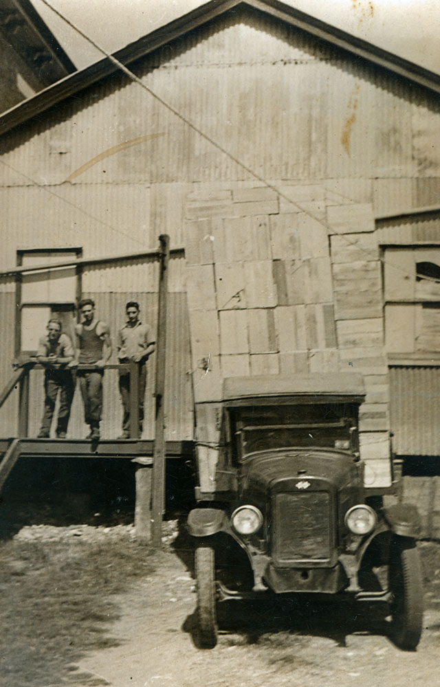 Three workers in front of box factory, Ipswich, n.d.