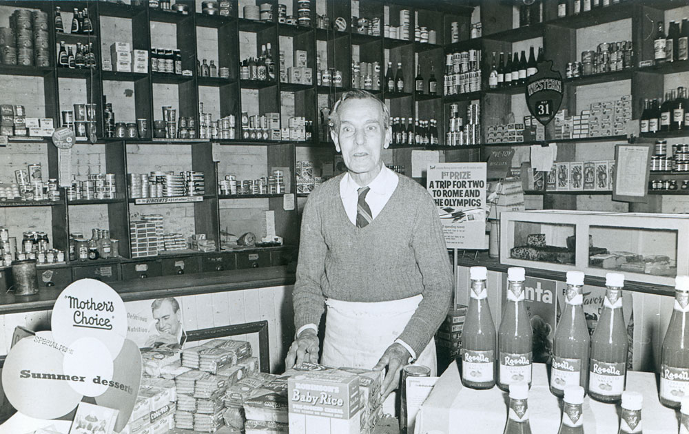 Alfred Lowe in his grocery shop on the corner of Warwick Road and Park Street, Ipswich, 1960