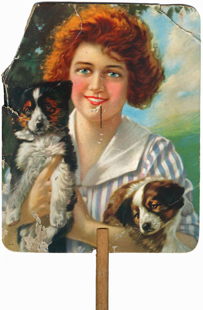 Advertising fan (cardboard) of girl with two dogs, for Finch &amp; Nixon, Ipswich, c.1931