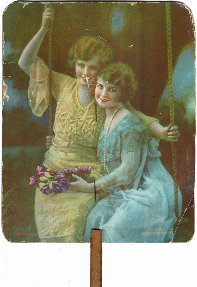 Advertising fan (cardboard) picture of two girls, for Londy Bros., Ipswich, c.1931