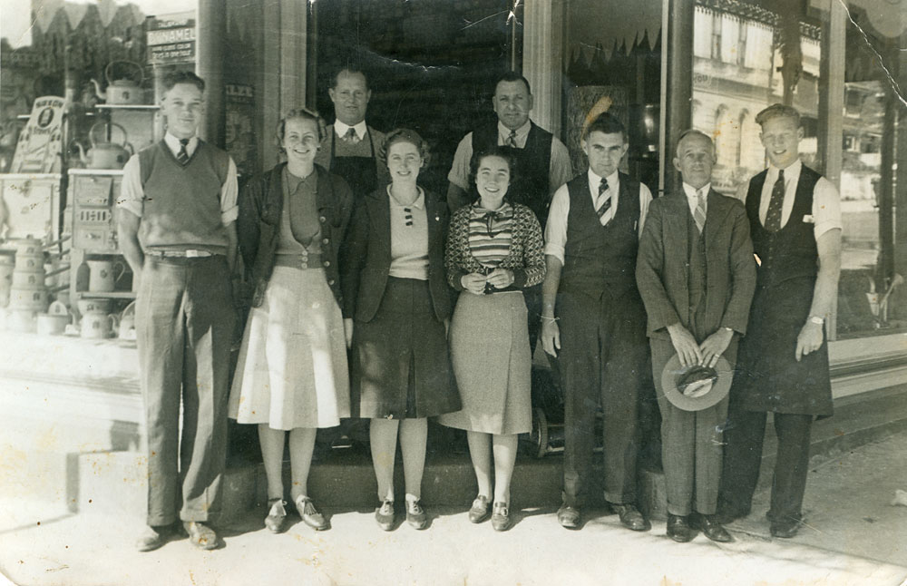 Staff of McKenzie &amp; Jackson, corner of Limestone &amp; East Streets, Ipswich, late 1930s