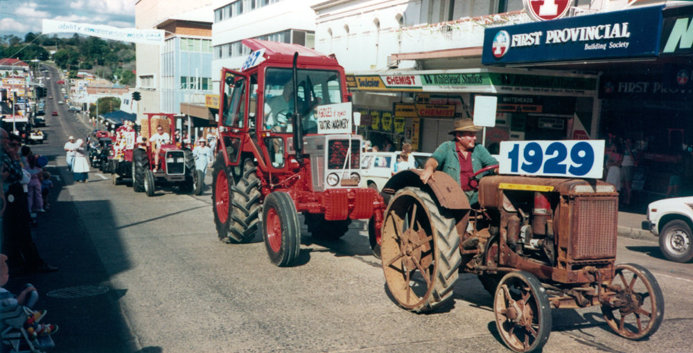 Keidges Farm Machinery float in parade held during opening of the Ipswich Mall celebrations, Brisbane Street, Ipswich, 1987