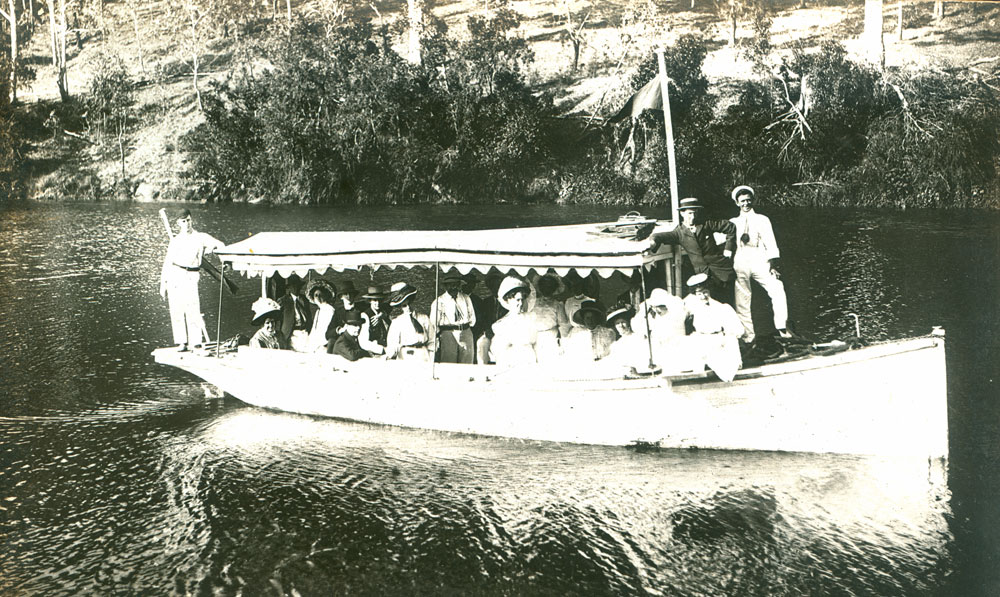 Trip on the motor launch 'Celia' near Dinmore Rocks on the Bremer River, Ipswich, 1909