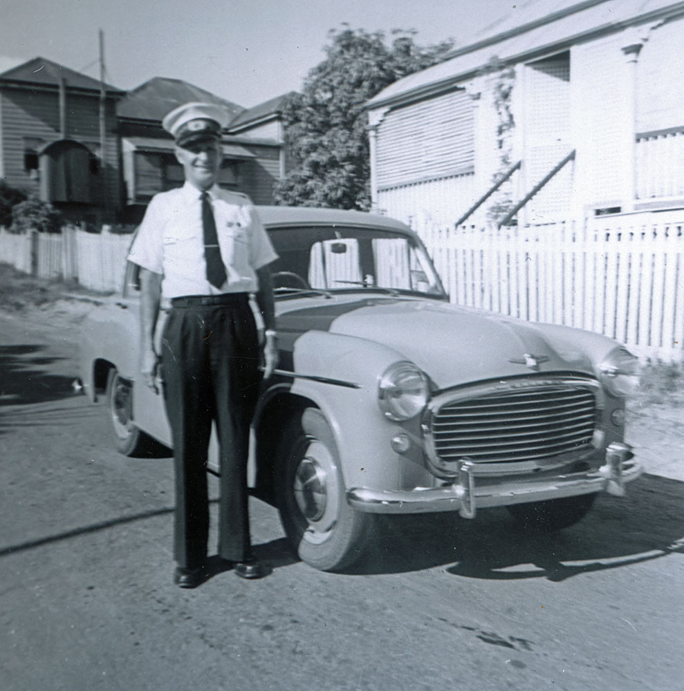 Jack McMahon, Ambulance Officer, in front of home, Ipswich, 1960