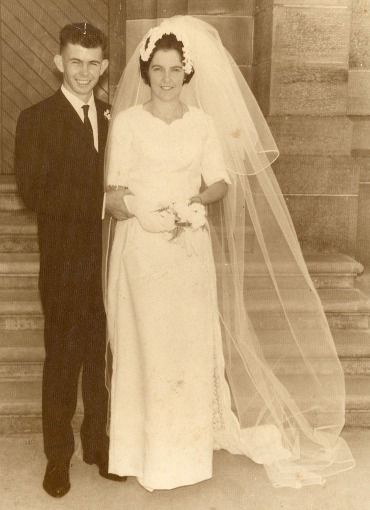 Newlywed couple Faye Bell and Alan Brims outside St Marys Church on their wedding day, Woodend, Ipswich, April 1967
