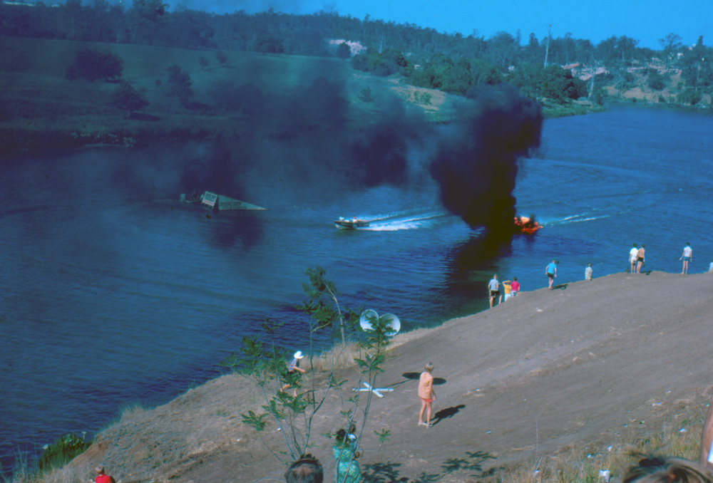 Water skiers and the 'Wall of Flame', Brisbane River, Goodna, 1968