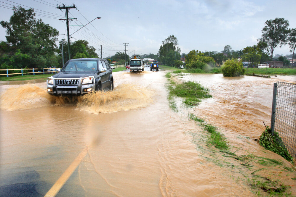 Wet weather conditions caused flooding on Deeging Creek Road, Yamanto, January 2008