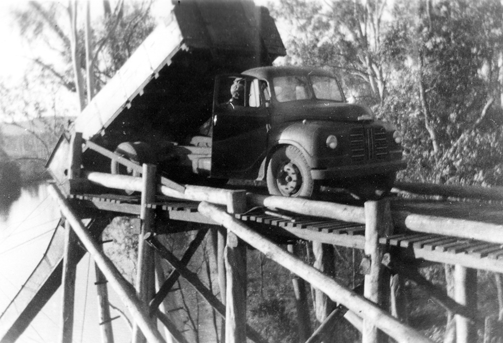 Truck dumping at original river loading point for Westfalen Mine No. 2, Dinmore, Ipswich, 1952
