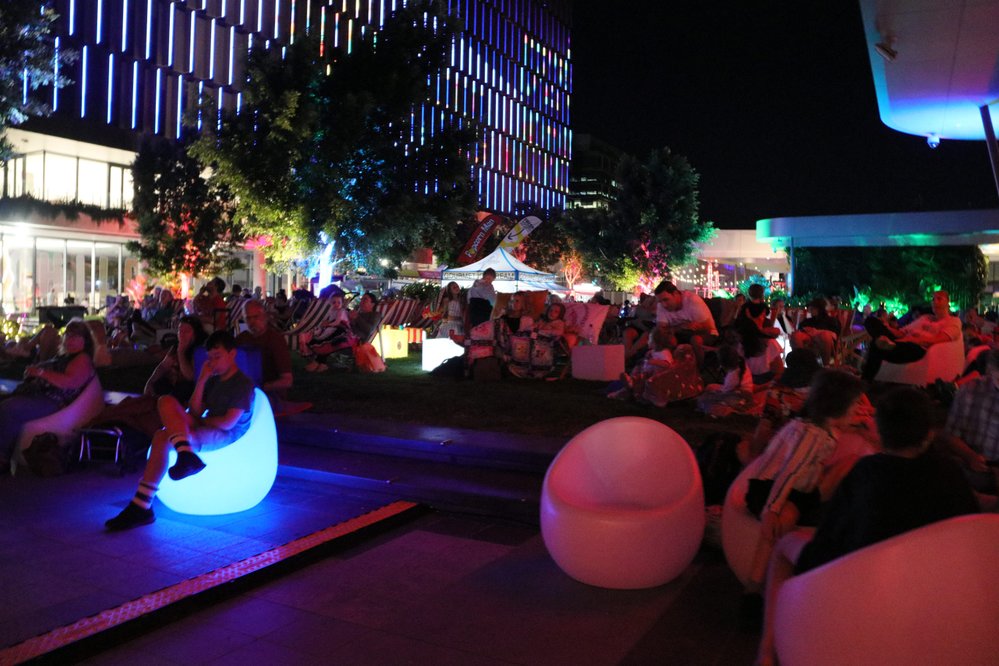 Watching the free Christmas Movie at Christmas in Ipswich: St Nicholas Precinct, Nicholas Street Precinct &amp; Tulmur Place, Ipswich, 2021