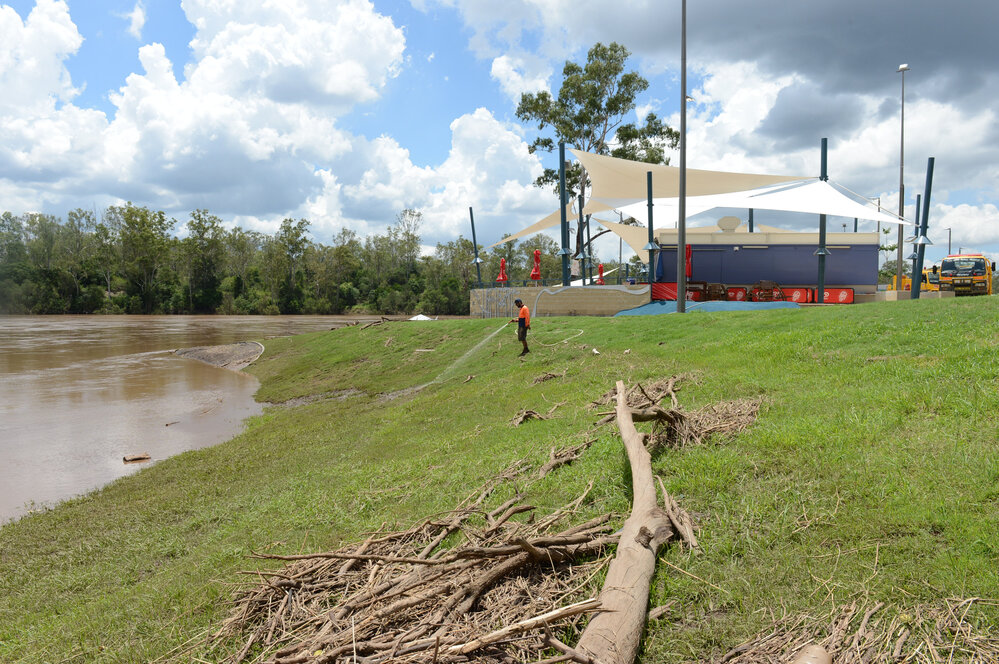 Cleaning up after flooding at Colleges Crossing, January 2013