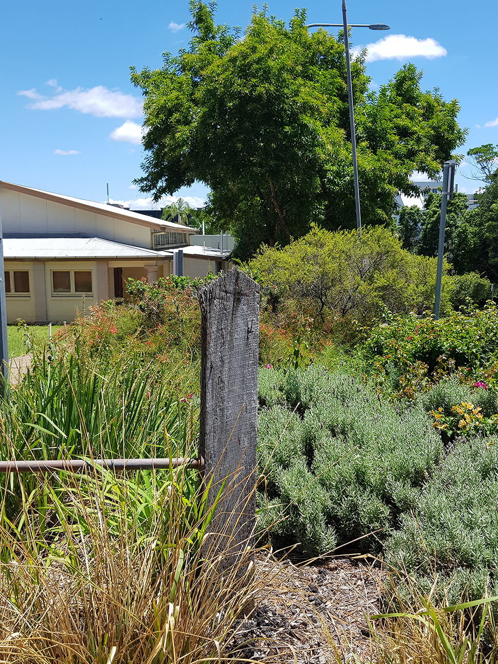 Ipswich Masonic Hall Centre and fence post, 2018