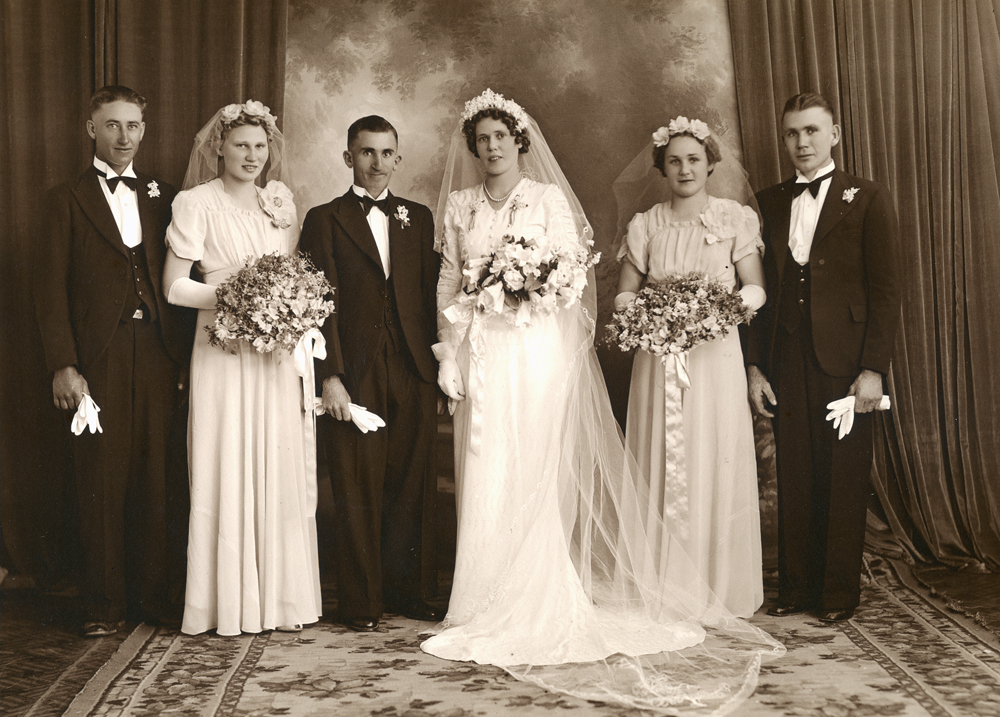 Formal bridal party portrait of Allen and Iris Meier (nee Lyon) with bridesmaids Coral and Norma Lyon, Ipswich, 1940