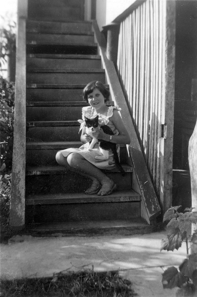 Bronwyn Brown with cat, 12 Shelley Street, Brassall, Ipswich, 1960s