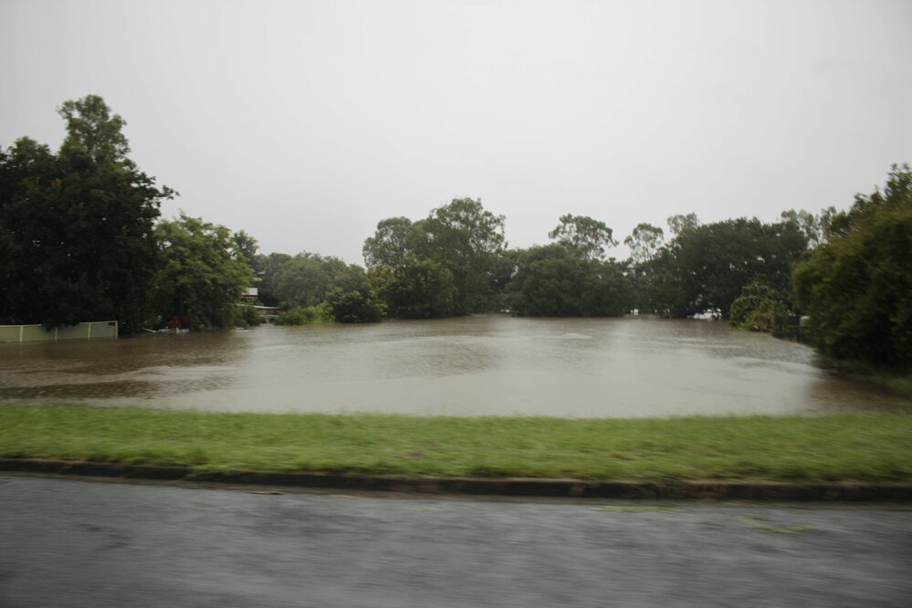 Flooded vacant block at Flint Street, during 2022 flood event, North Ipswich, 27th February 2022