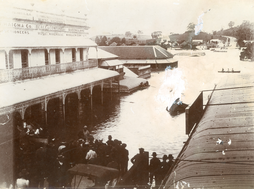 Bremer River in flood, Brisbane Street looking east towards Limestone Hill, Ipswich, 1893