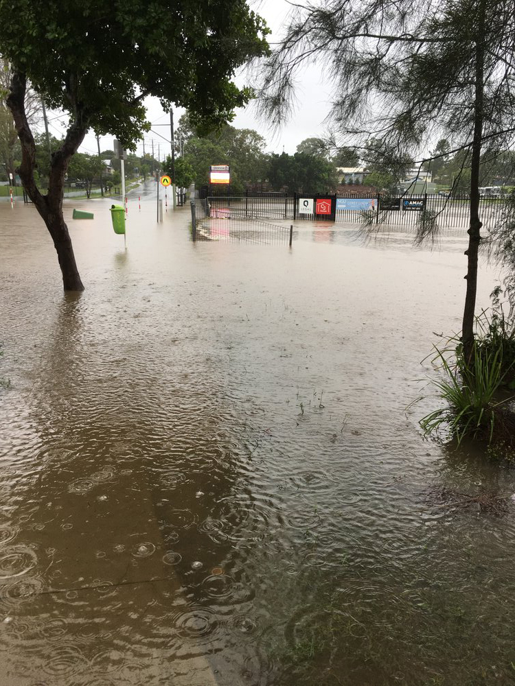 Hunter Street, looking towards Ipswich State High, during flooding, Brassall, Ipswich, 2022