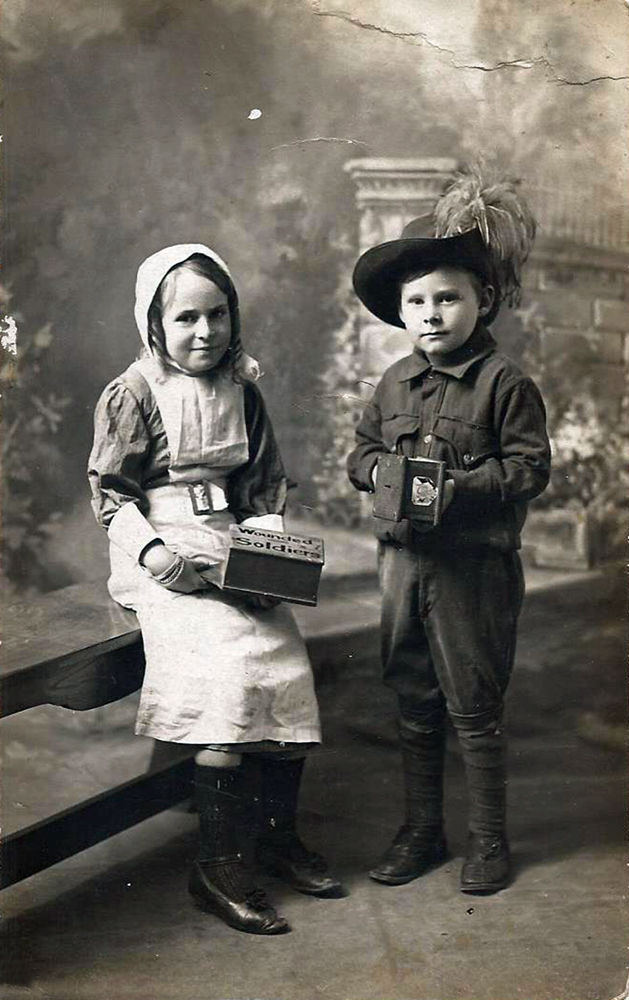 Two children dressed up to collect funds for the war effort during World War I, c.1915