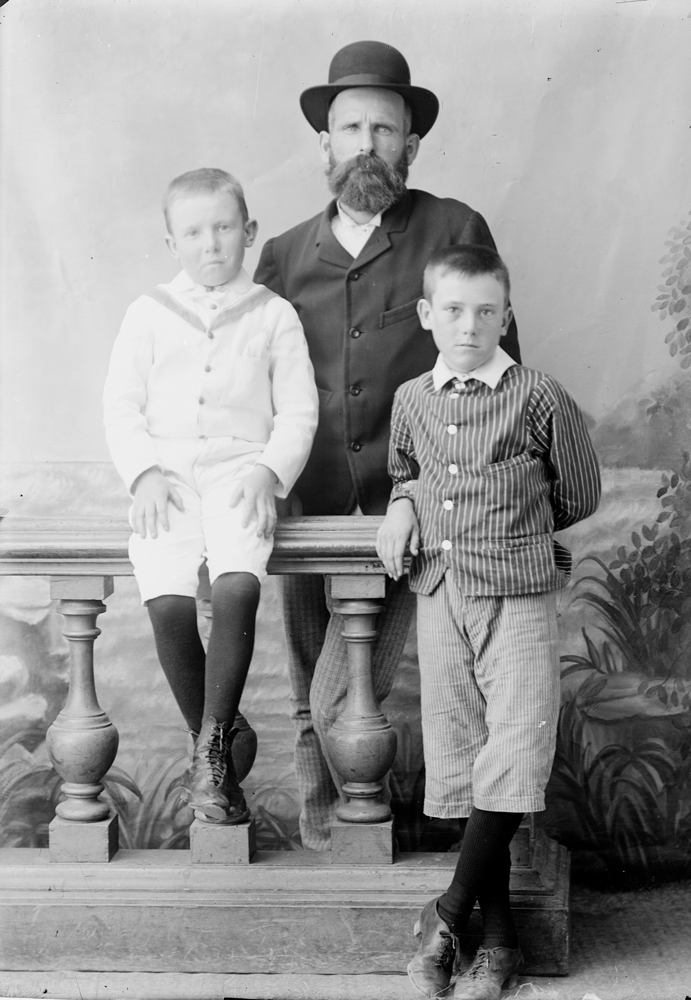 Man in hat with two boys. Thought to be a studio portrait of Benjamin Taylor with nephews? Philip and Benjamin, c.1900's
