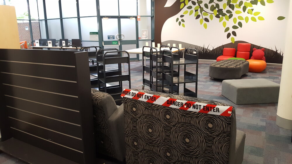 Barricading children's programming area to use as a work space, Ipswich Libraries, May 2020