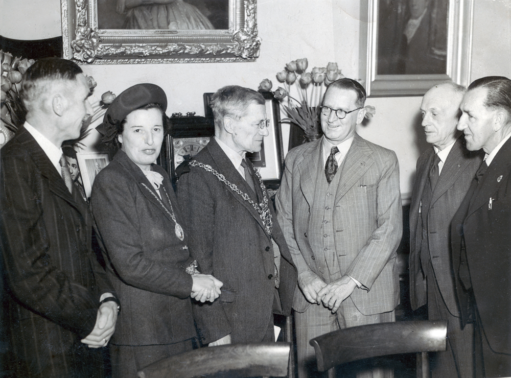 Mayoral reception in Suffolk, England for William Johnson from F. W. Johnson City Motor Works, Ipswich, Queensland, 1948
