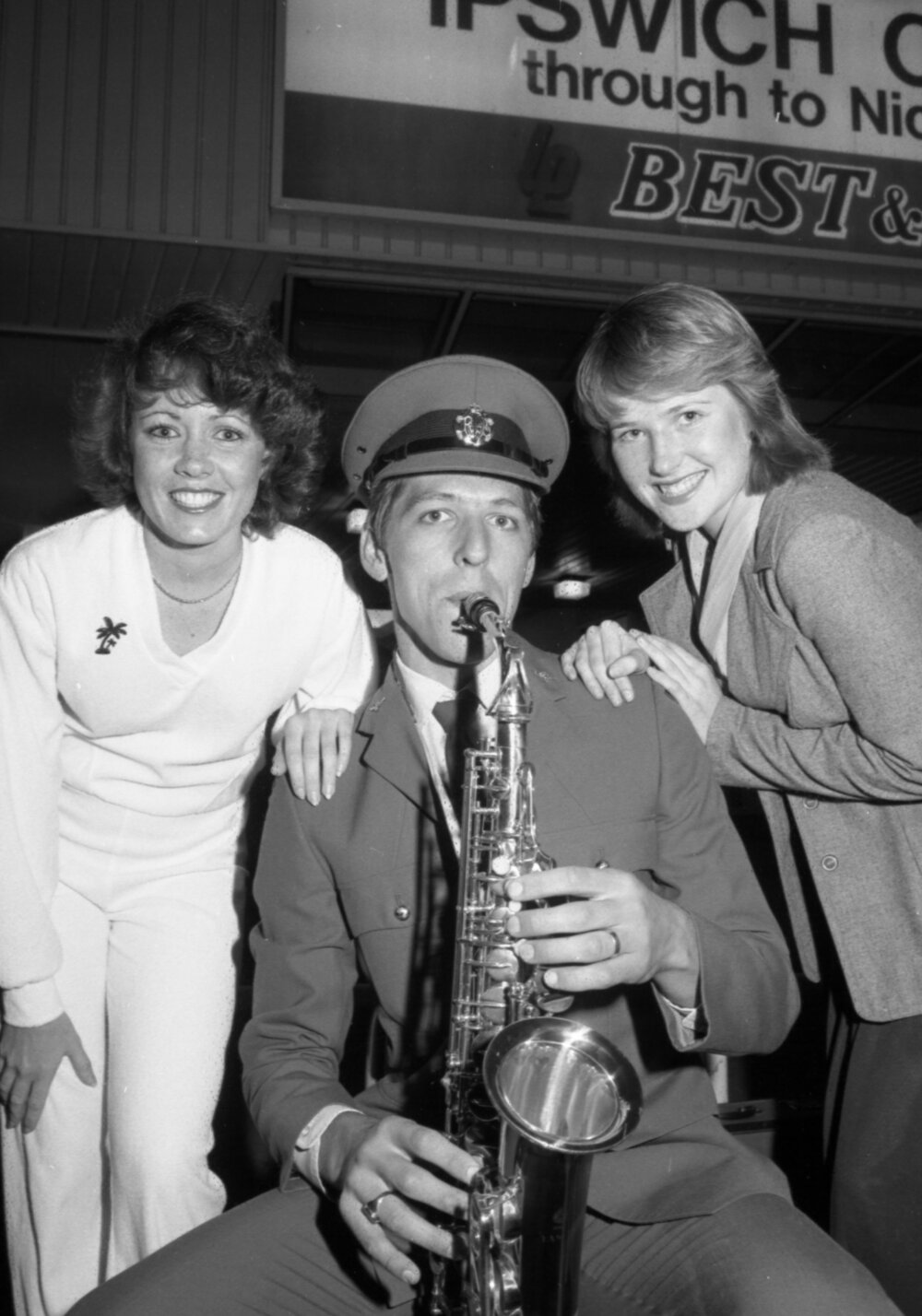Ladies with saxophonist from the Ipswich Vice-Regal Model Band at the Ipswich Colour Festival, Ipswich, August 1980