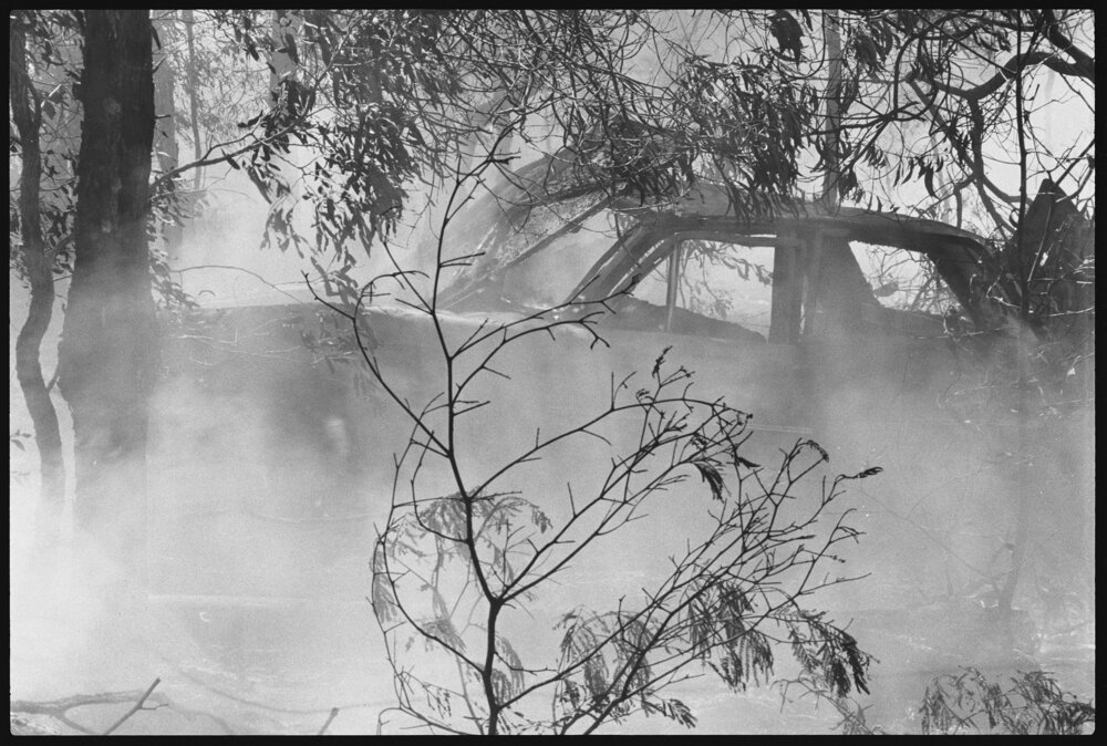 Firefighters dealing with a fire at an unidentified location, Ipswich region, September 1987