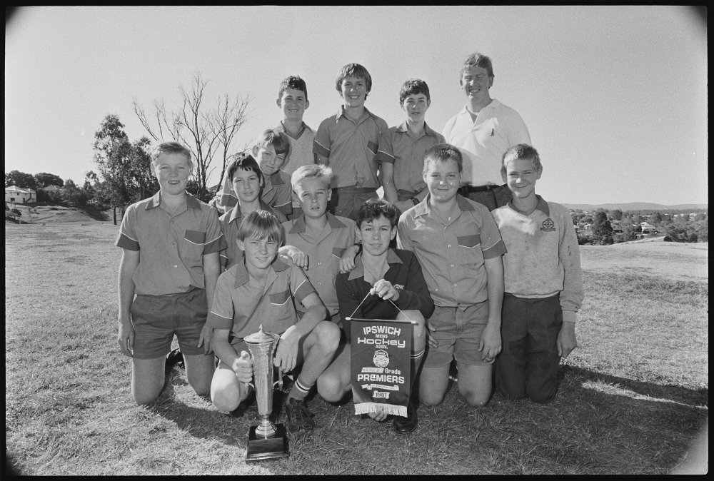 Thought to be St Edmund's Hockey Team players and coach with trophy, Ipswich, September 1987