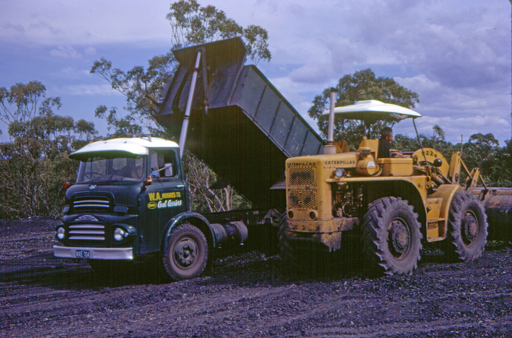 Truck and plant machinery of W. A. Hughes at Rhondda Mine, Bundamba, Ipswich,  c.1970