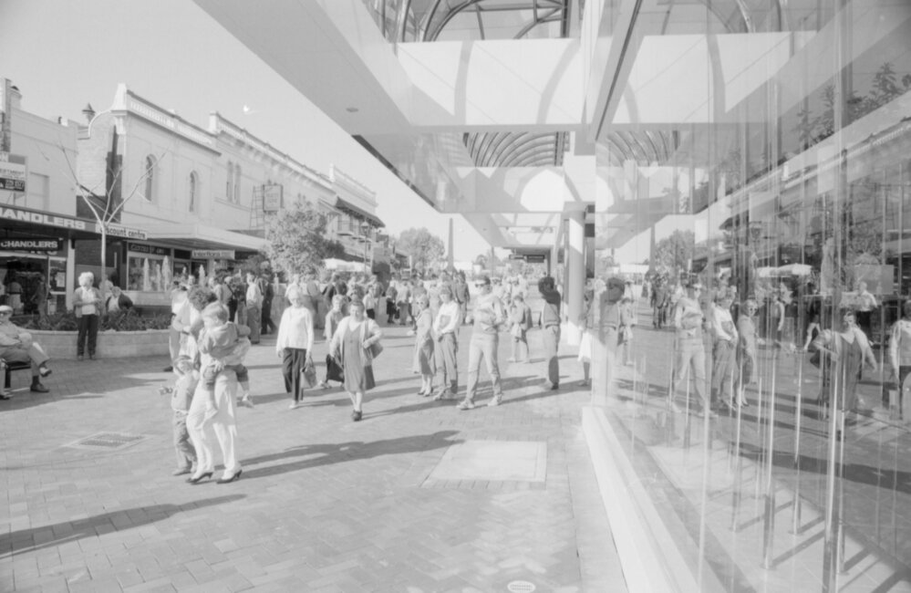 People walking through the open-air section of the newly opened Ipswich City Mall, Ipswich, August 1987
