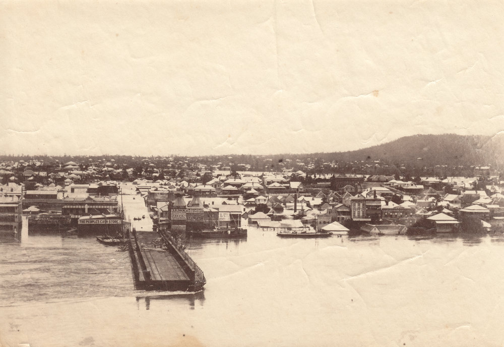Victoria Bridge being washed away by the Brisbane River during flood, Brisbane, 1893