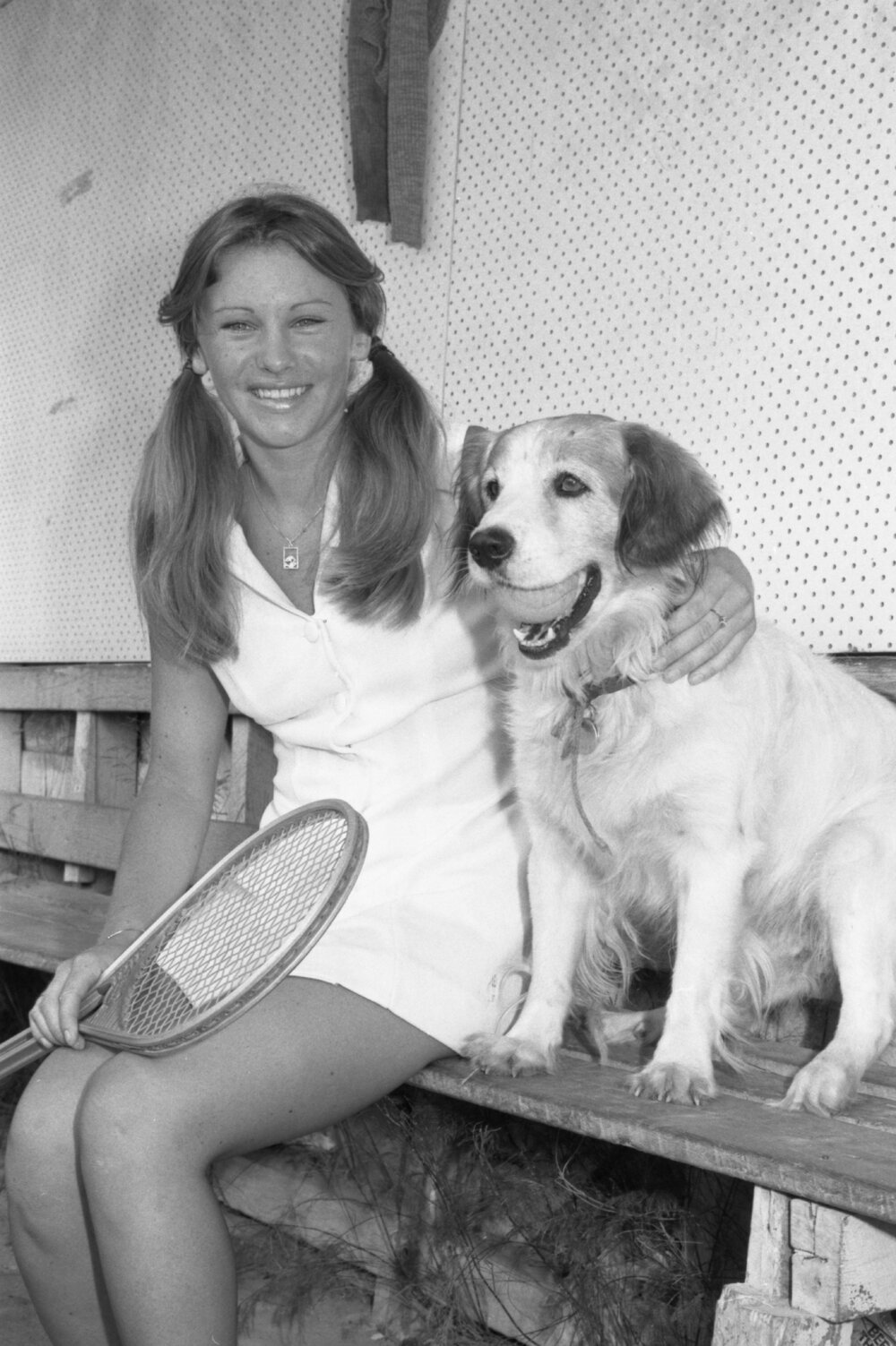 Kim playing tennis with ball dog, Ipswich, Queensland, January 1978