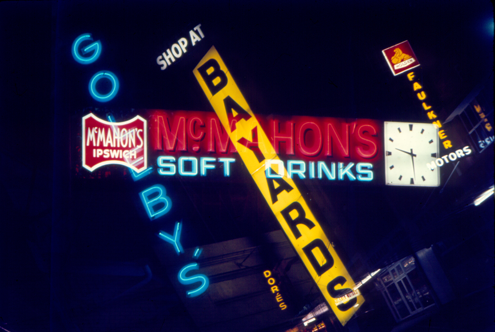 Montage of neon signs of businesses in Ipswich, 1970