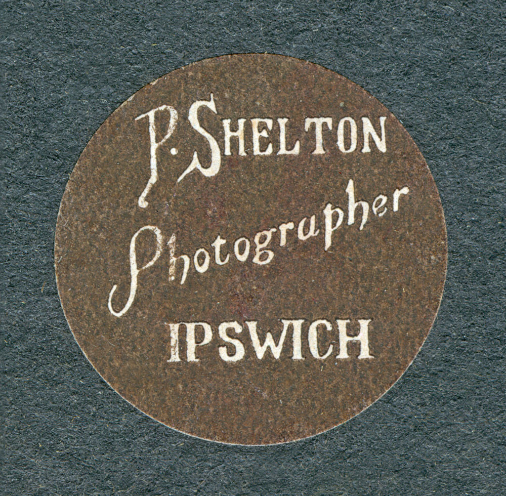 Trademark of Percy Shelton, photographer, Ipswich between 1903-1910