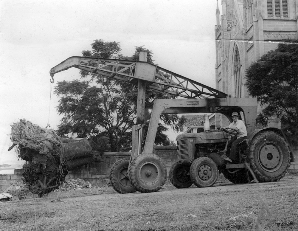 Machine used during construction work being carried out at front of St Mary's Catholic Church, Ipswich, 1953-1954