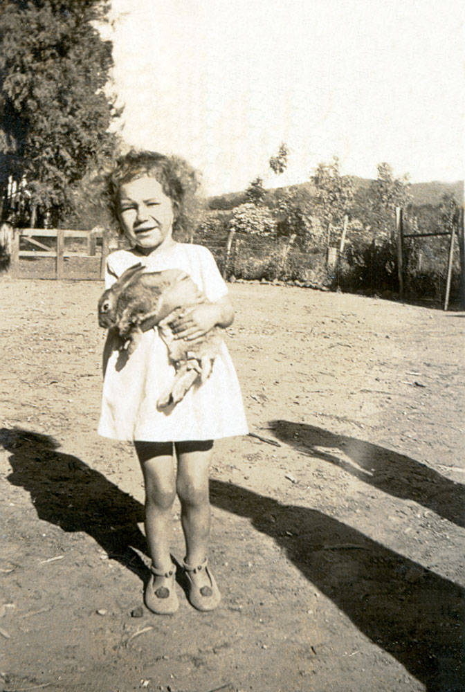 Child with pet rabbit, Ipswich, c.1928